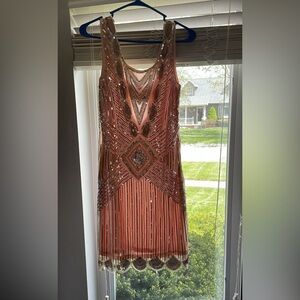 Champagne, rose gold, and silver sequined dress. Size medium.